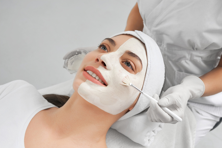 Professional Aesthetician Performing a Facial Treatment