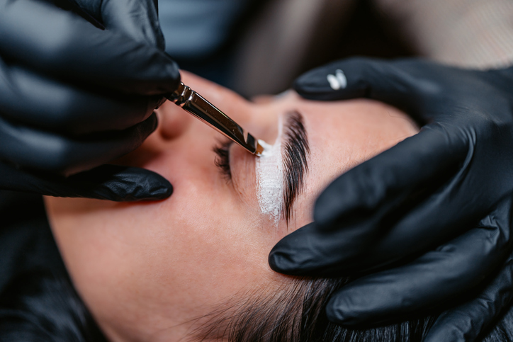 Threading Eyebrows with Precision in Beauty School